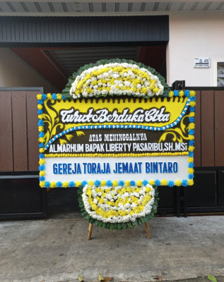 Papan Bunga Duka di Wegee Muka